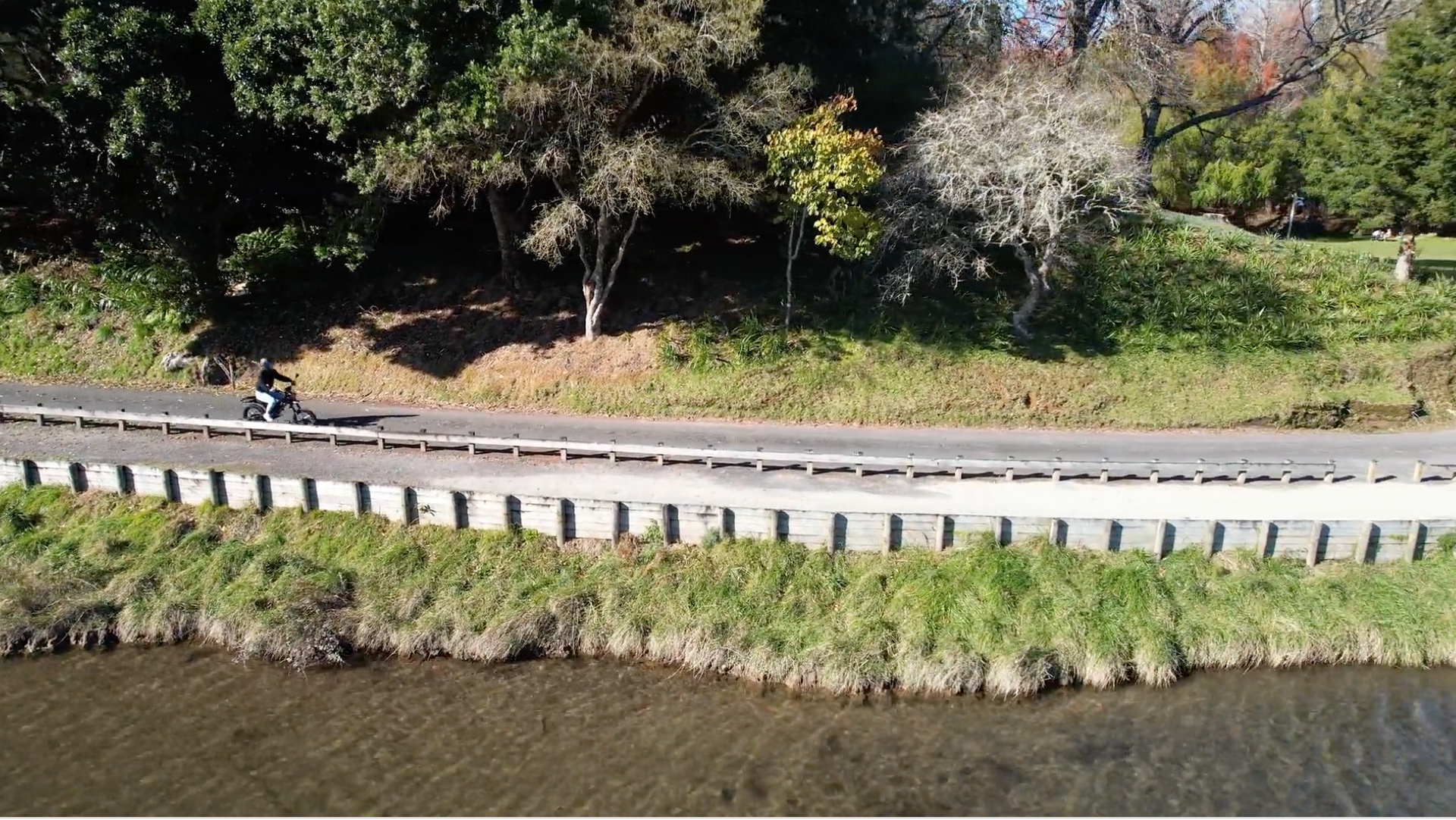 An aerial view of a motorbike on a path.