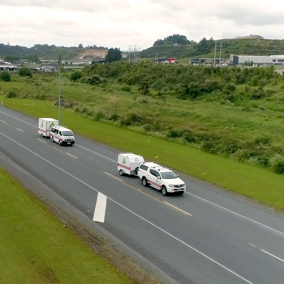 Aerial view of AR Plus vehicles on motorway in Tauranga.