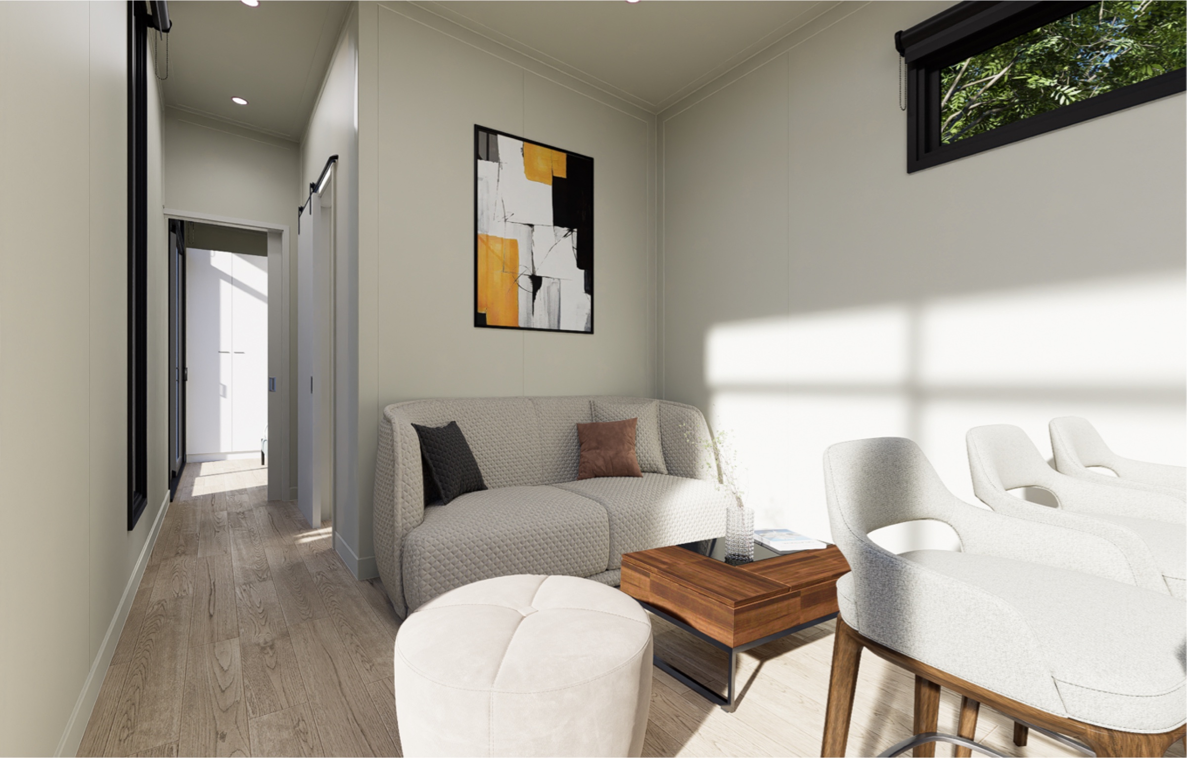 Living space with a sofa, coffee table, ottoman, and chair.